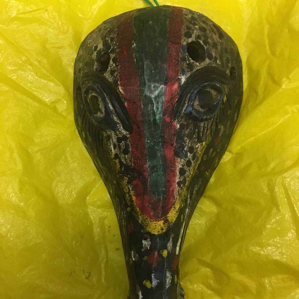 Colorful hanging wooden mask decorative